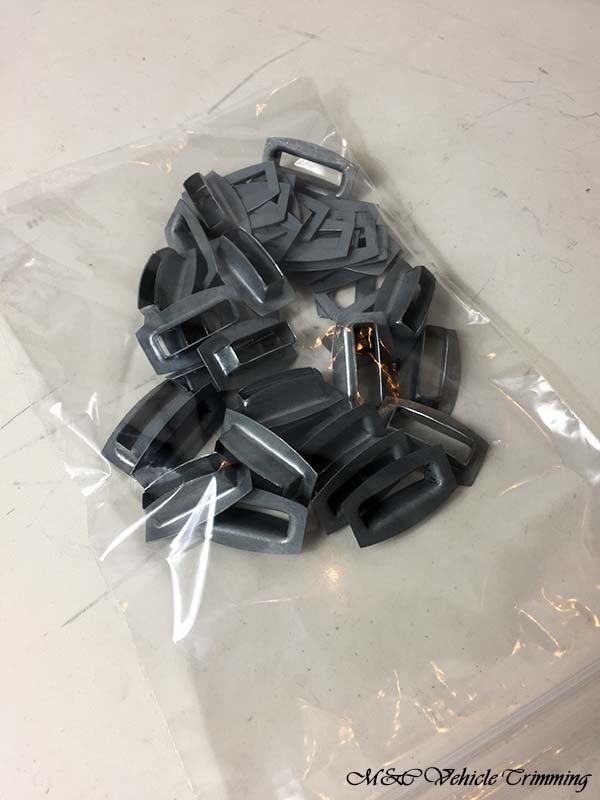 M&C Vehicle Trimming - Rectangular slotted eyelets with disc M&C Vehicle Trimming - Rectangular slotted eyelets with disc